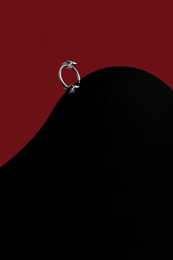 Lily Cross Mini Hoops - Silver